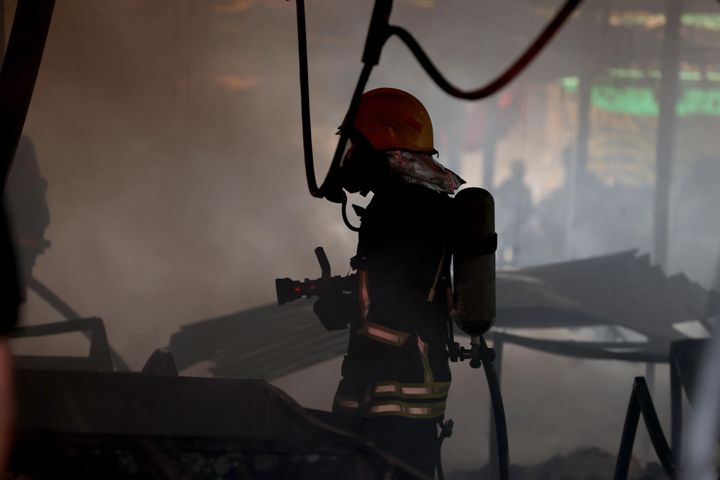 Civil defense teams and firefighters continue extinguishing and cooling the areas where a fire broke out Thursday as a result of Israeli forces raiding the Al-Bireh area of Ramallah in occupied West Bank.