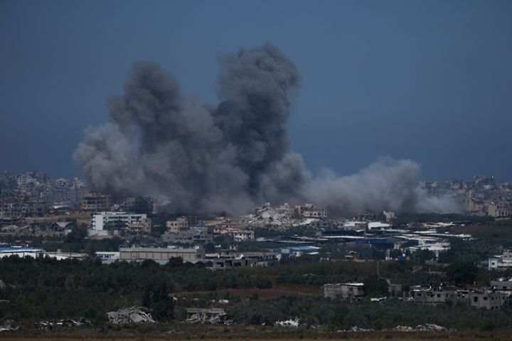 Smoke rises following an Israeli airstrike in the Gaza Strip, as seen from southern Israel, Friday, May 17, 2024. (AP Photo/Tsafrir Abayov)