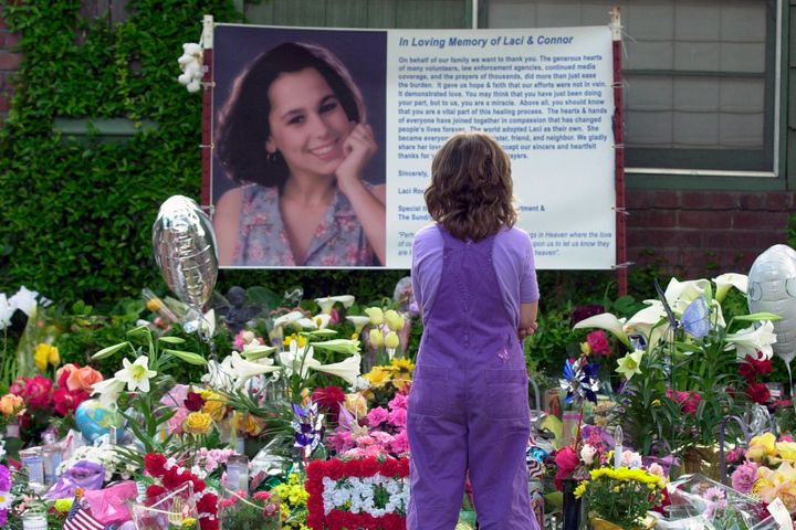 A memorial in honor of Laci Peterson is seen outside the house she shared with husband Scott Peterson in Modesto, California, in 2004.