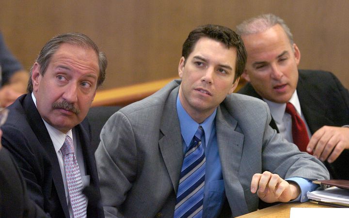 Scott Peterson, seen at center in 2004 with his defense attorneys, was convicted of first-degree murder for his wife's death and second-degree murder for the death of Conner.