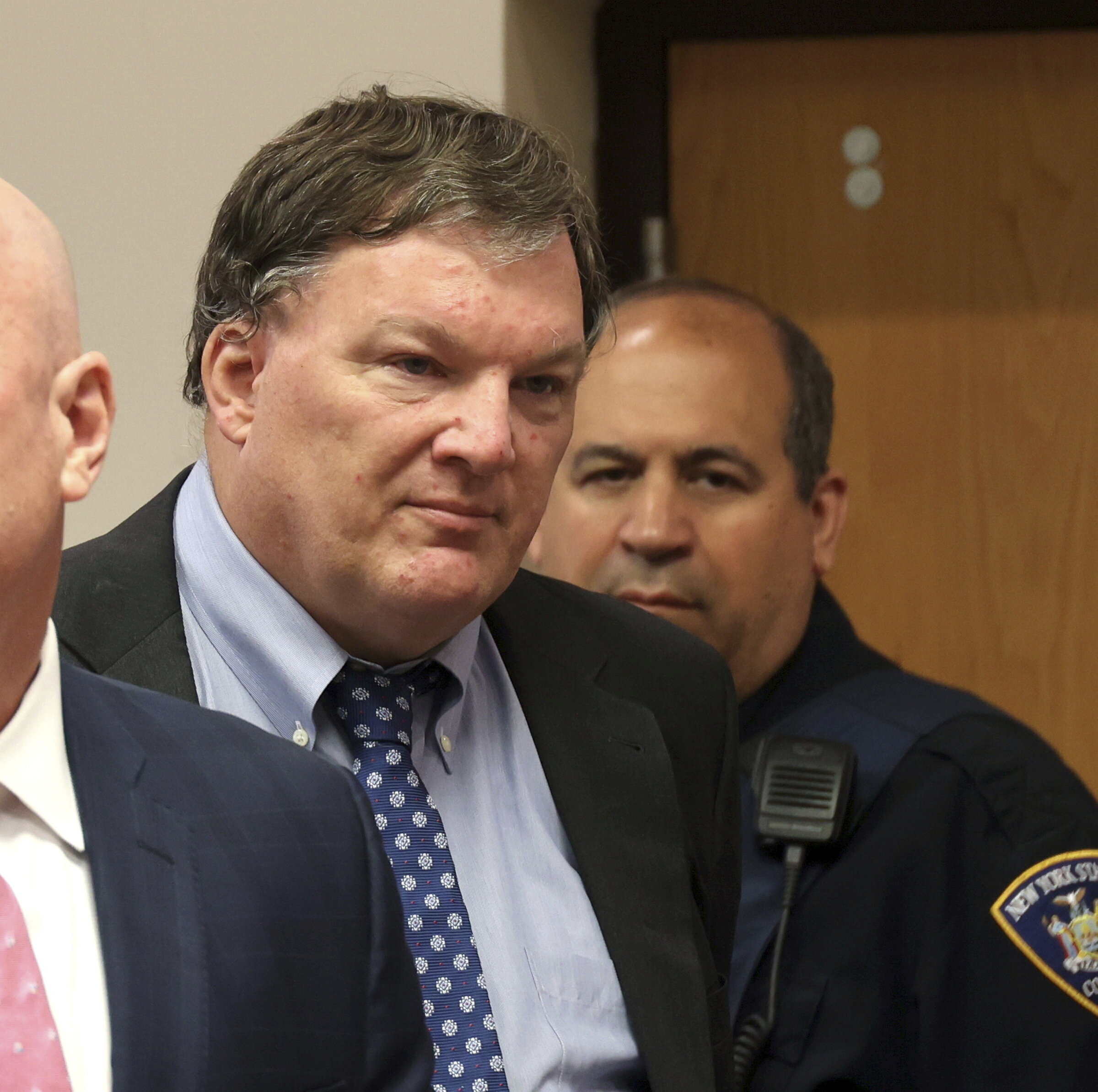 Rex Heuermann, charged in the Gilgo Beach serial killings on Long Island, appears Thursday for a hearing at Suffolk County Court in Riverhead, New York. Heuermann was charged Thursday in the deaths of two more women after prosecutors said they gathered new DNA evidence and found a computer document they said contained a “blueprint” of the crimes.