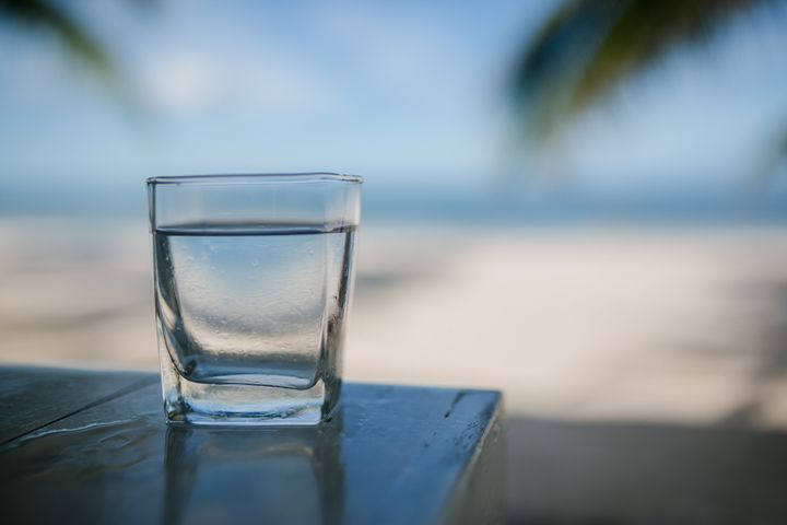 Does your sunscreen fill this shot glass? If not, you're not using enough to cover your body.