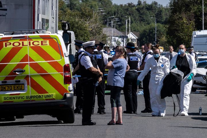 Police work at the scene in Southport, England, where a man has been detained and a knife has been seized after a number of people were injured in a reported stabbing, Monday July 29, 2024.