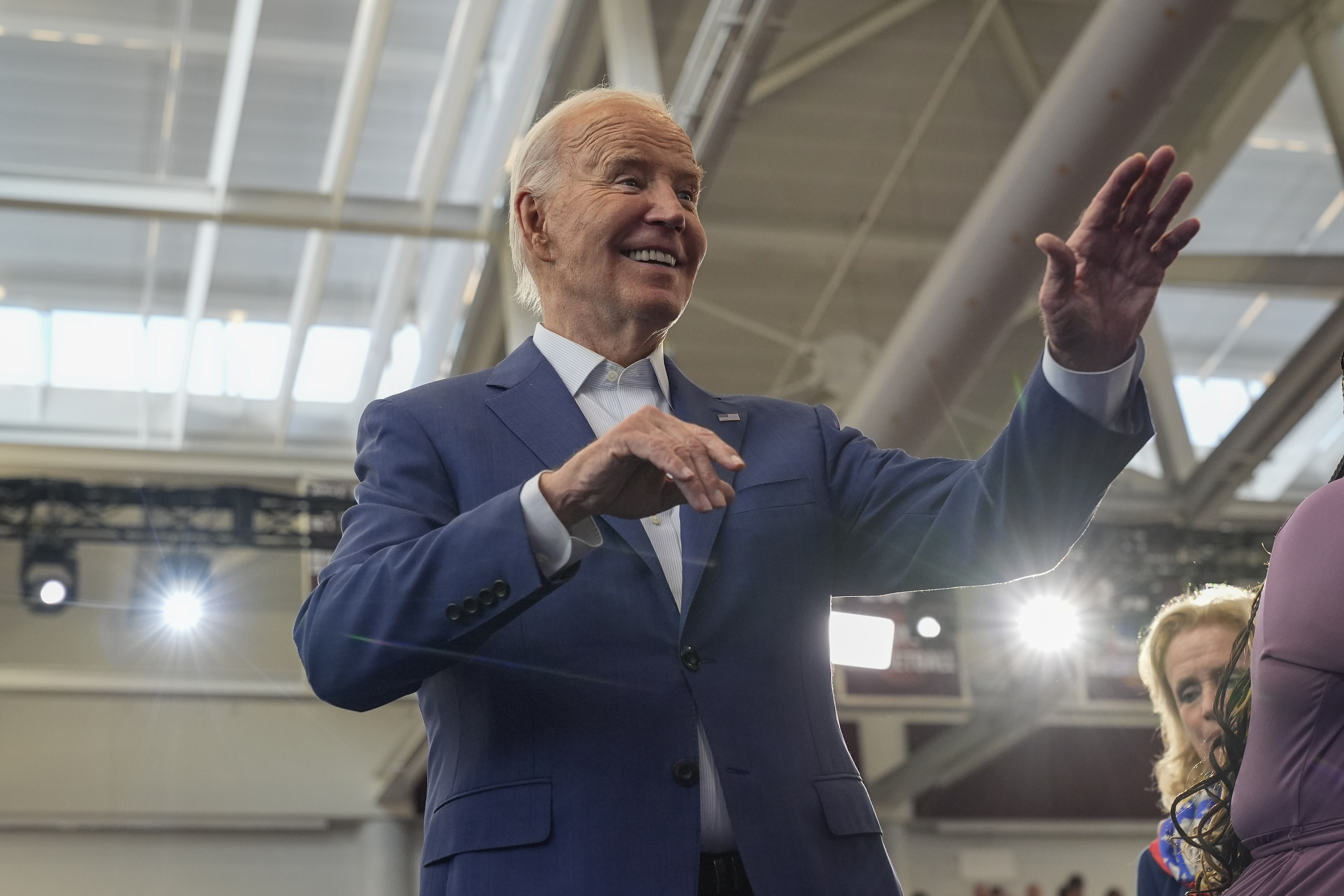 President Joe Biden waves after speaking to supporters at a campaign event at Renaissance High School, Friday, July 12, 2024. (AP Photo/Jacquelyn Martin)