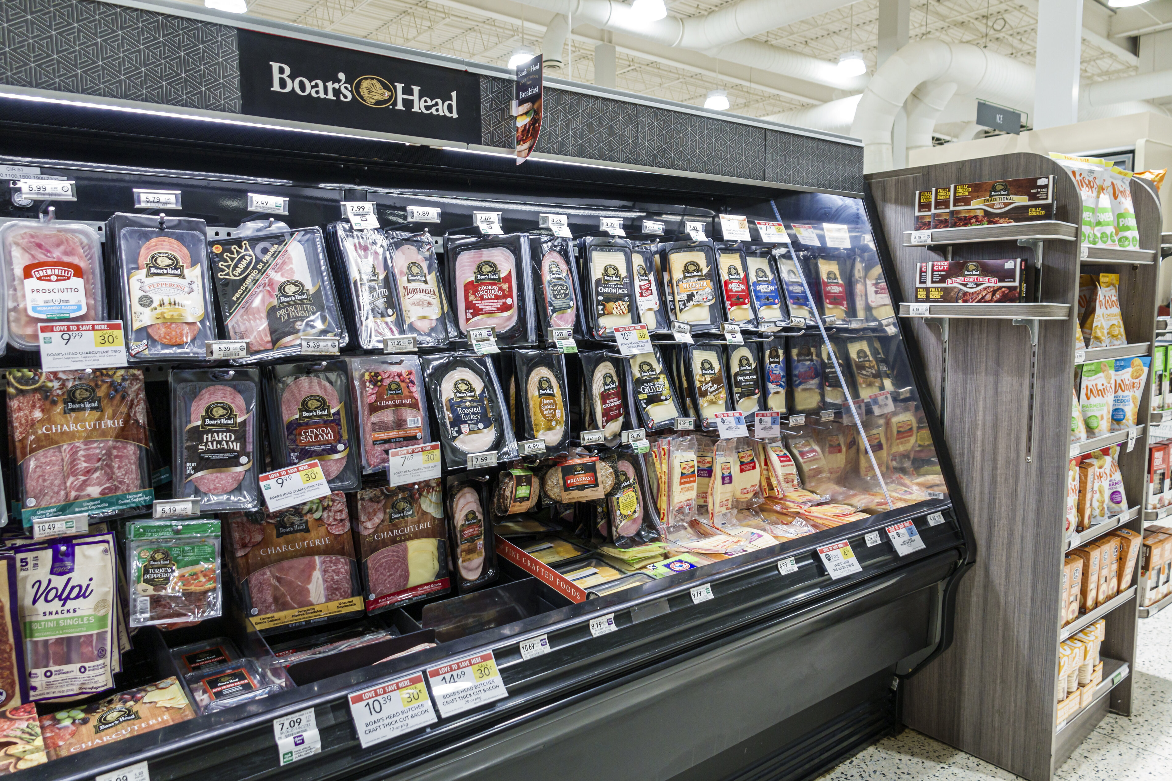 Boar's Head deli meats are seen in a grocery store display.