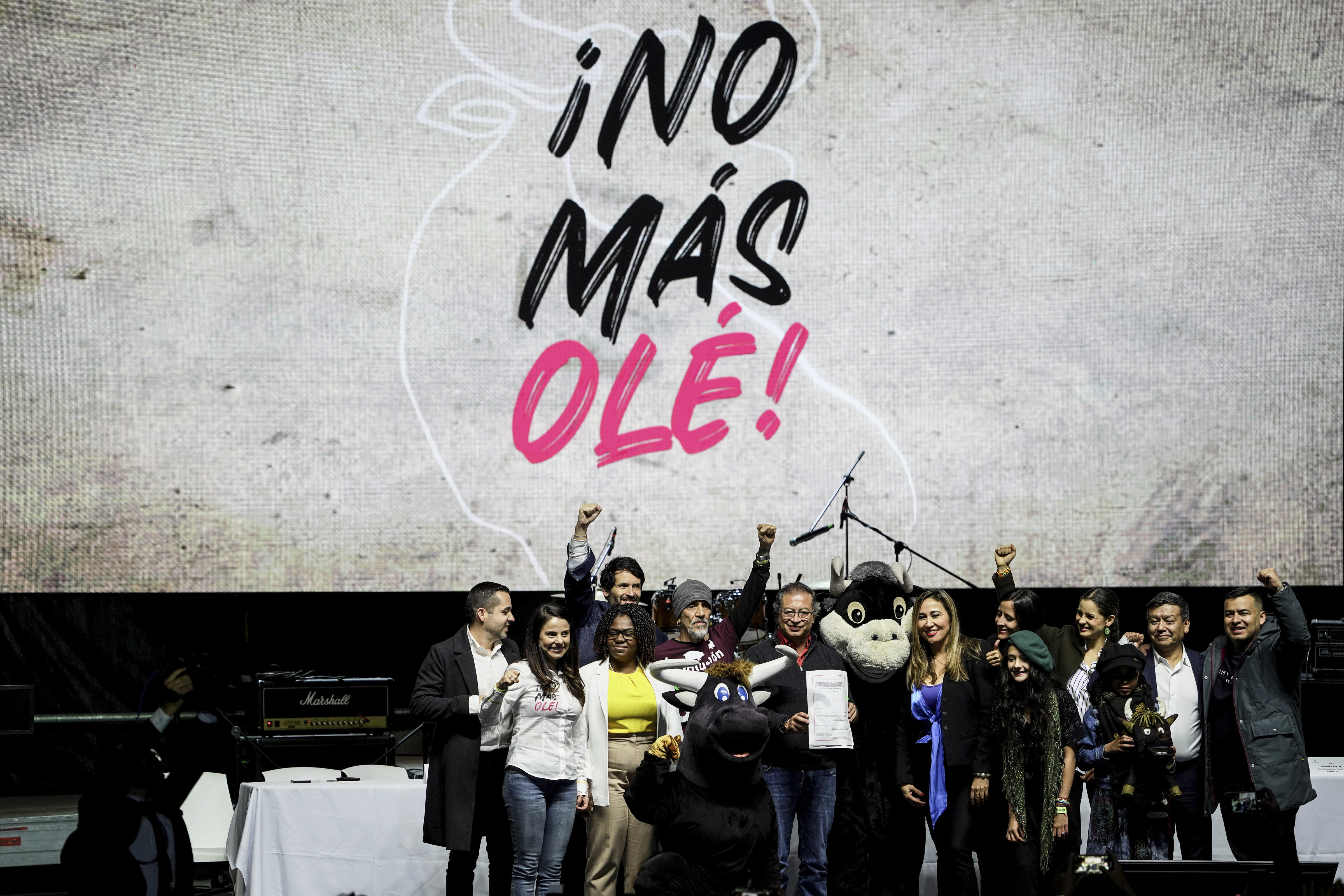 Colombian President Gustavo Petro signed the bill in front of hundreds of animal rights activists during a ceremony held in Bogota’s bullring, after a supporter in a bull costume handed him a copy of the legislation.