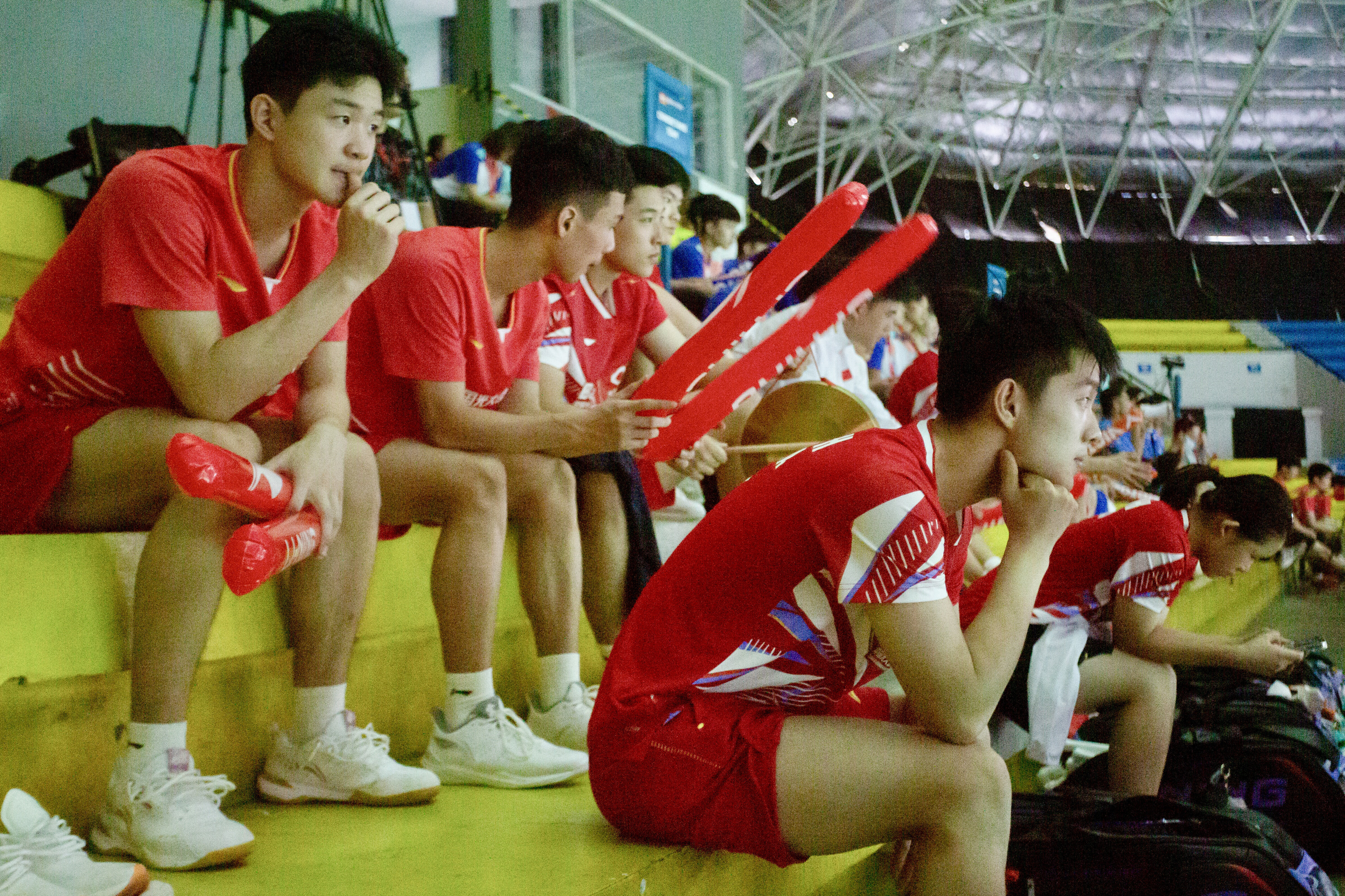 Chinese badminton players watch the 2024 Asia Junior Championship in Indonesia on July 1, 2024, one day after the sudden death of player Zhang Zhijie.