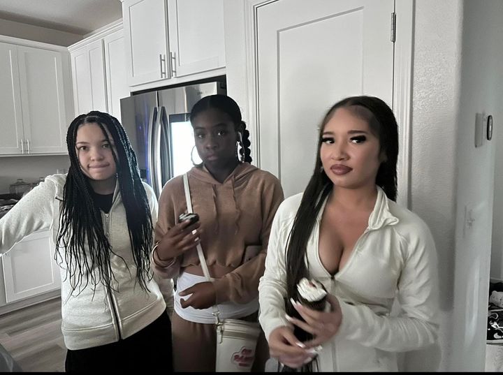 Zion (left) and Aleeka (right) Qualls pose with their cousin Madison (middle) during a recent visit to their aunt Courtney Franklin's home.