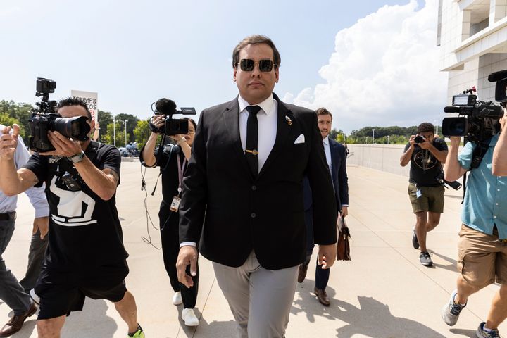 Former U.S. Rep. George Santos arrives at court in Central Islip, New York, Aug. 19, 2024.