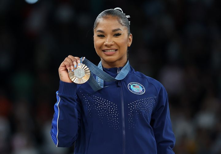 Jordan Chiles of the United States shows off a bronze medal as she poses for photos during the victory ceremony of women's floor exercise of artistic gymnastics at the Paris 2024 Olympic Games in Paris, France, Aug. 5, 2024. (Photo by Cao Can/Xinhua via Getty Images)