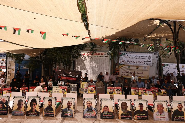 Palestinians attend a demonstration calling for the release of bodies of Palestinian prisoners in Israeli jails, in Ramallah, occupied West Bank on Tuesday.