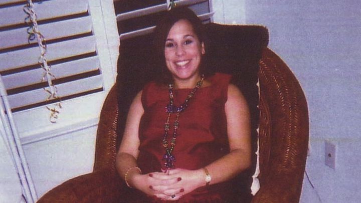 Laci Peterson pictured at a friend's Christmas party in 2002. Her husband, Scott Peterson, attended a different Christmas party with his secret girlfriend the same night.