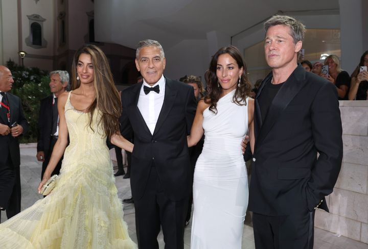 Amal Clooney, George Clooney, Brad Pitt and Ines de Ramon attend the "Wolfs" red carpet during the 81st Venice Film Festival on Sept. 01, 2024, in Venice, Italy. Pitt and de Ramon have reportedly been dating since late 2022.