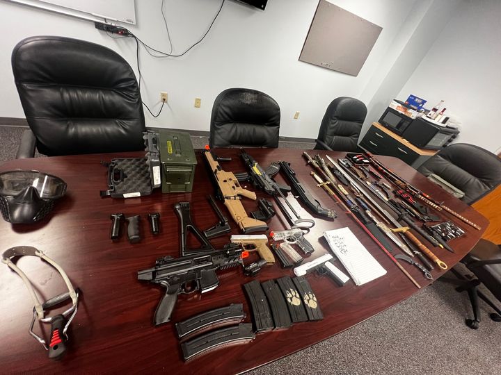 Authorities said they confiscated a number of fake firearms, fake ammunition, and knives from the boy's home.