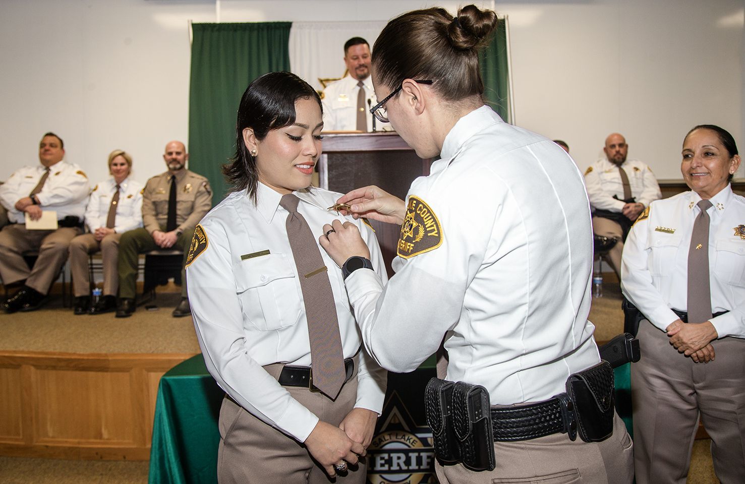 Deputy Marbella Martinez, pictured here with colleagues from the Salt Lake County Sheriff’s Office, was found dead at the home she shared with her father on Aug. 1.