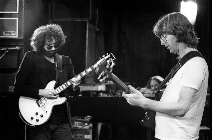 Jerry Garcia and Phil Lesh rehearse with the Grateful Dead at the Orpheum Theater in June 1976 in San Francisco, California.