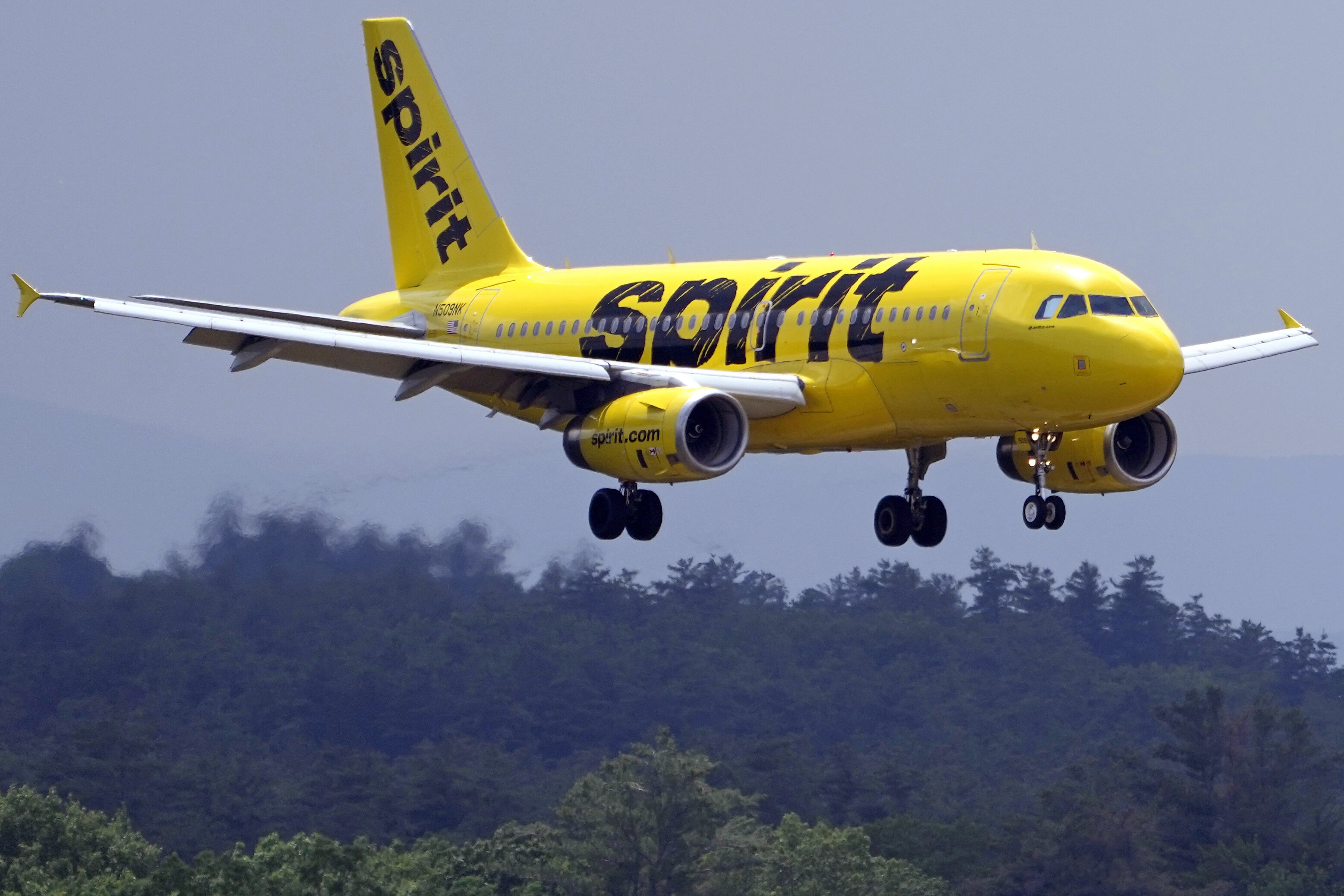 A Spirit Airlines 319 Airbus approaches Manchester Boston Regional Airport for a landing, on June 2, 2023, in Manchester, N.H.