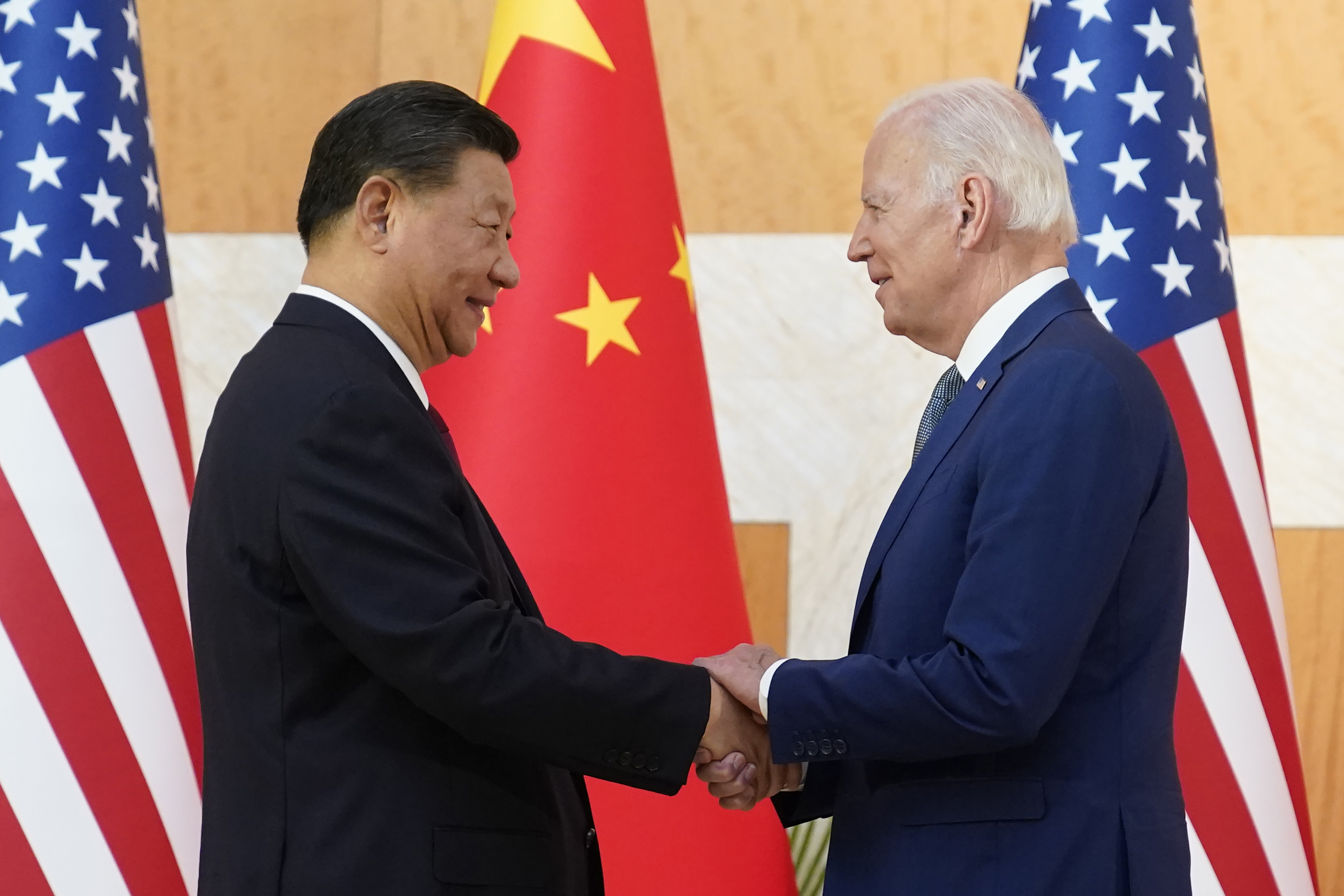 U.S. President Joe Biden and Chinese President Xi Jinping shake hands before their meeting on the sidelines of the G20 summit meeting, Nov. 14, 2022, in Nusa Dua, in Bali, Indonesia. (AP Photo/Alex Brandon)