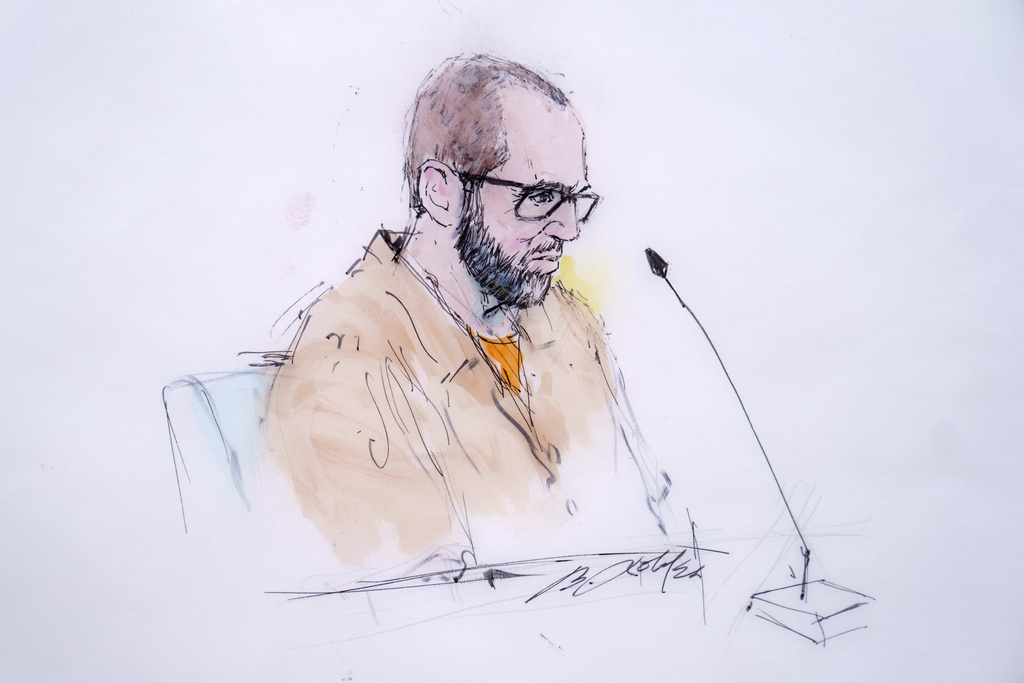 In this courtroom sketch, defendant Alexander Smirnov speaks in federal court in Los Angeles, Feb. 26, 2024.