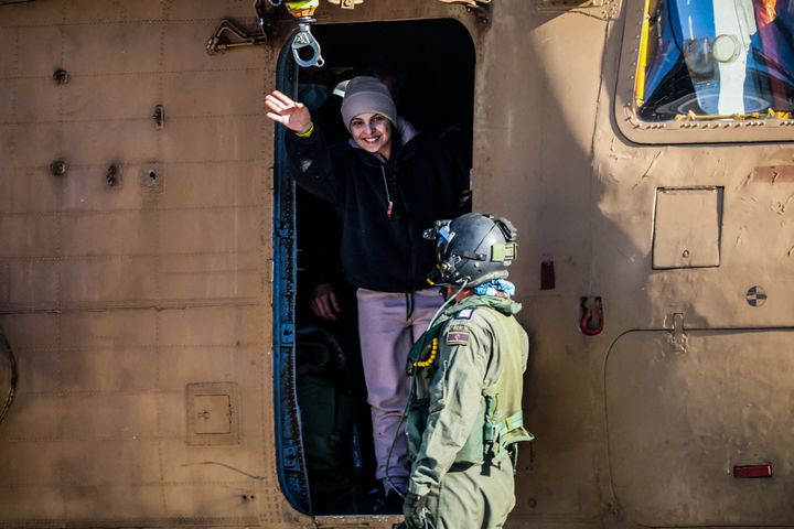 Newly released Israeli hostage Daniella Gilboa, waves as she leaves a military helicopter upon landing at the Beilinson Hospital in Petah Tikva on January 25, 2025. (Photo by Yossi ZAMIR / AFP via Getty Images)