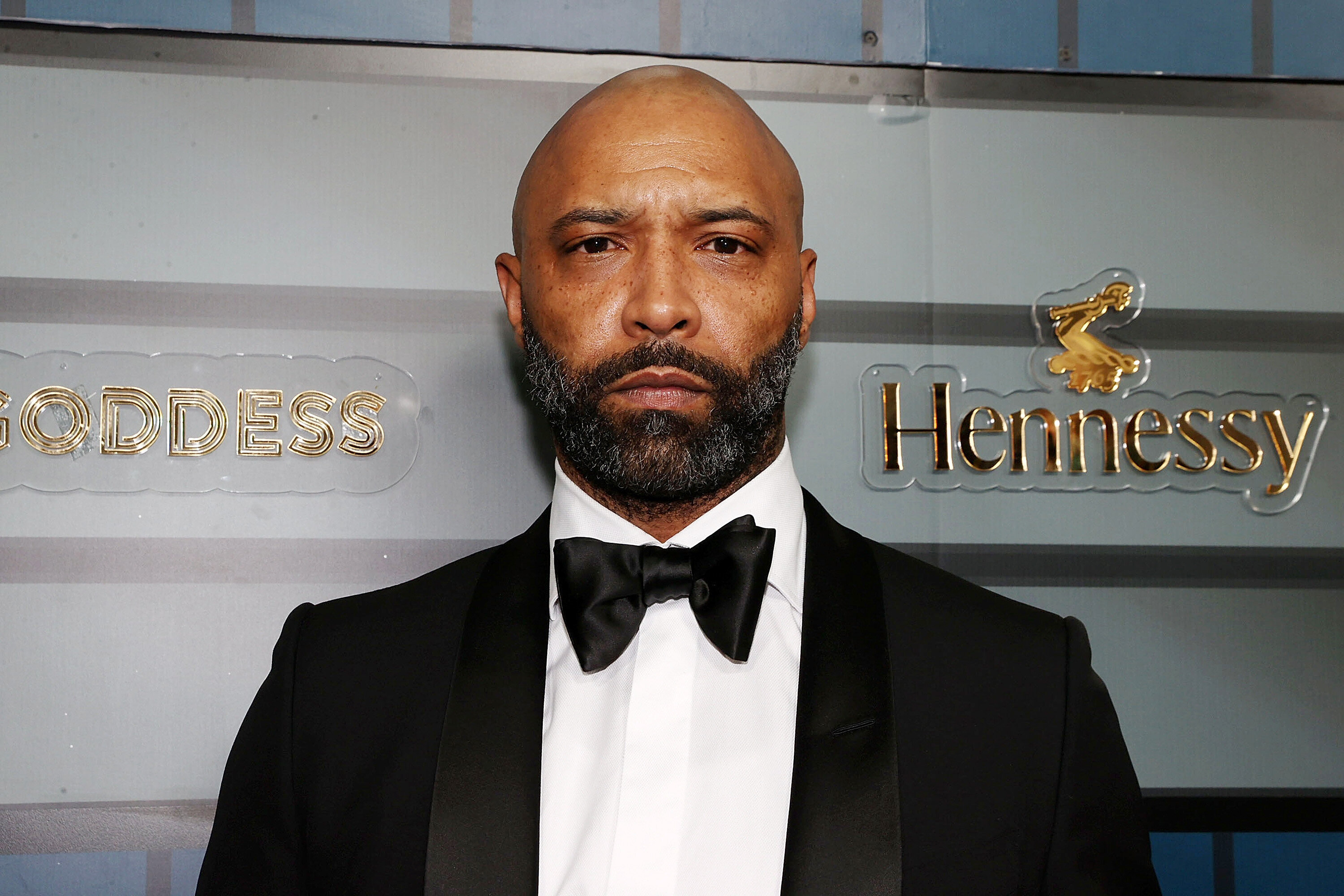 Joe Budden, shown here at an April 2022 event in New York City, was accused by a neighbor of standing naked in their apartment building's hallway.