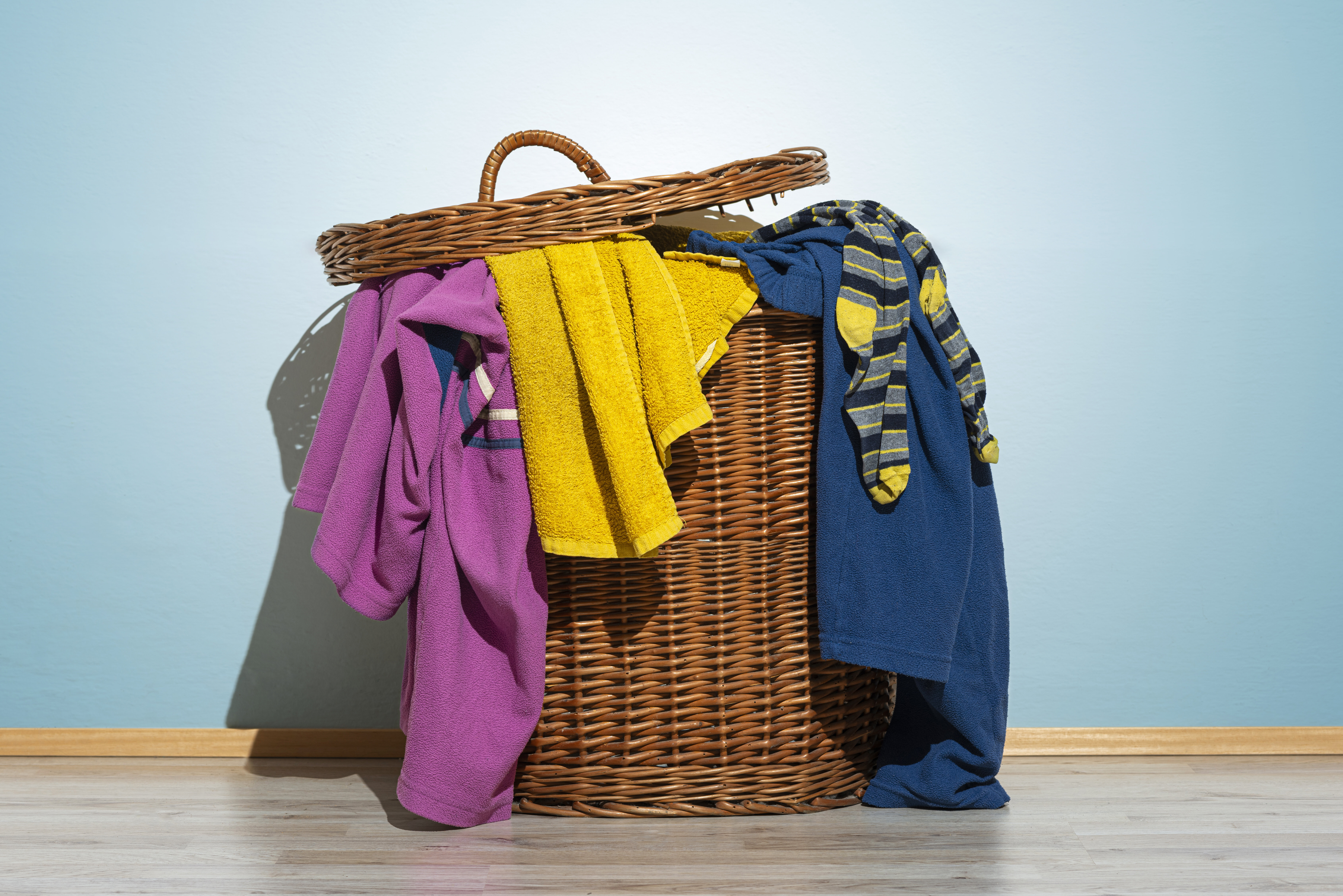 Norovirus is the most likely virus to be lingering on your unwashed clothes.