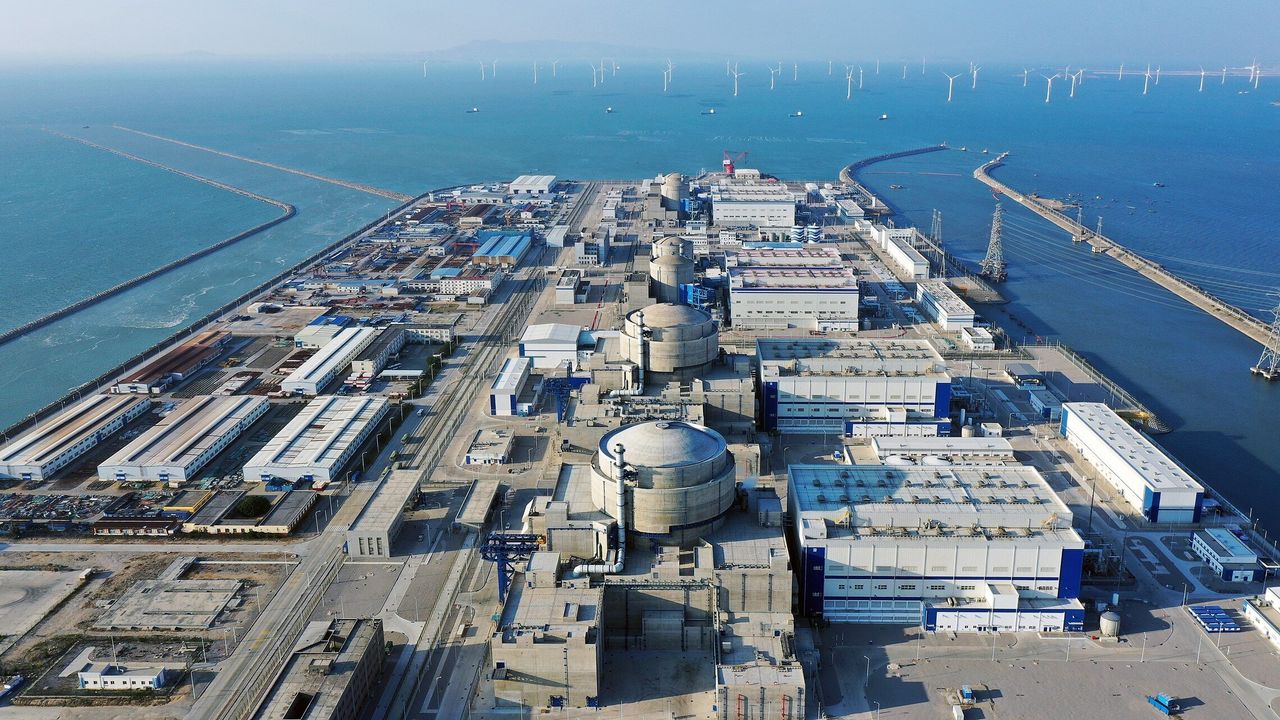 Aerial photo taken on Dec. 1, 2021 shows nuclear power units under the China National Nuclear Corporation CNNC in Fuqing, southeast China's Fujian Province. China's Hualong One demonstration project, a domestically designed third-generation nuclear reactor, has been completed and put into commercial operation.