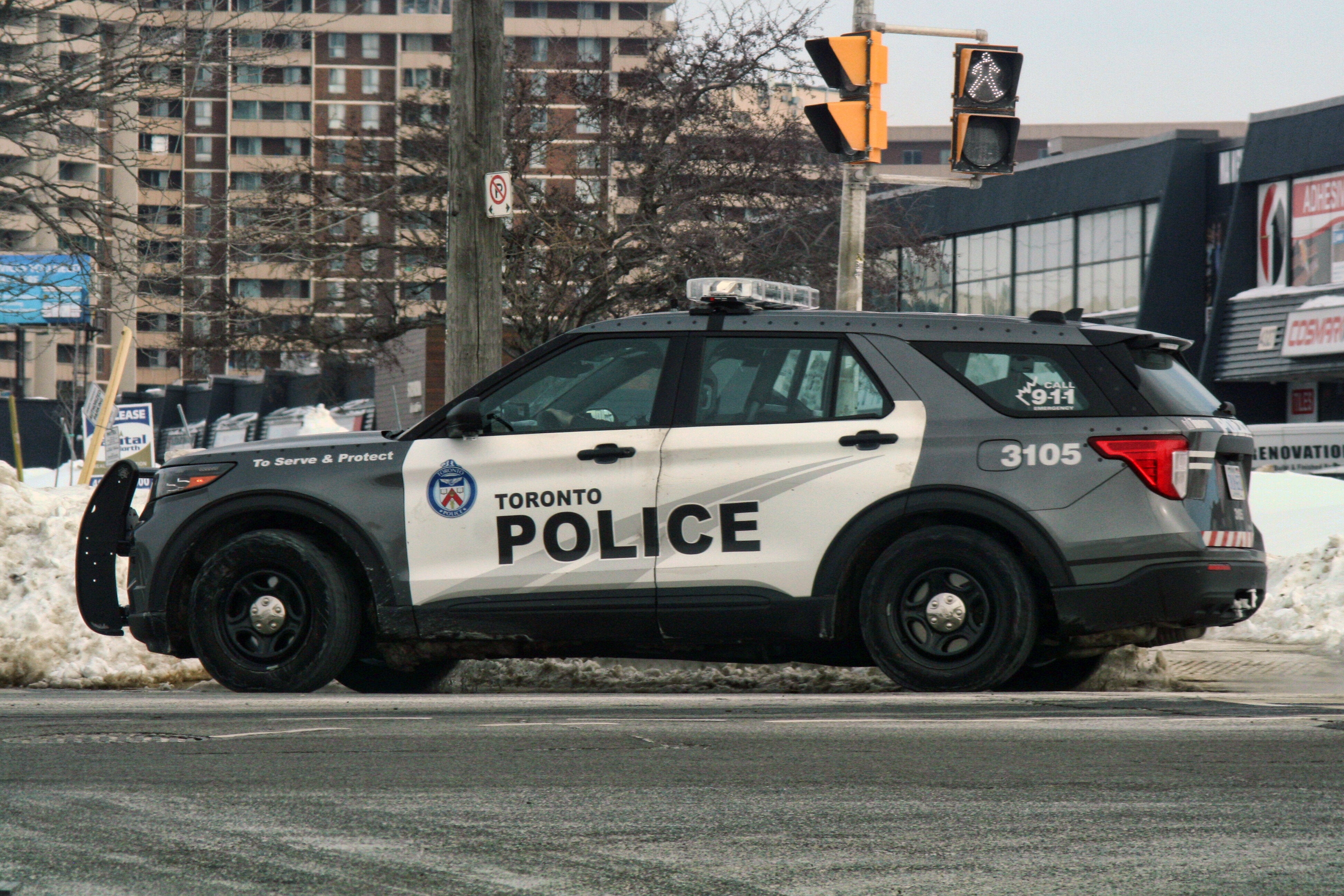 Three men allegedly shot up the Piper Arms Pub in Scarborough just before 10:40 p.m. Friday before fleeing in a vehicle, police said. A Toronto police vehicle is seen in February.