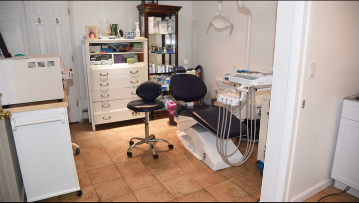 Police said they discovered a "fully functioning dentist's office" inside the home of a woman who was not a licensed dentist.