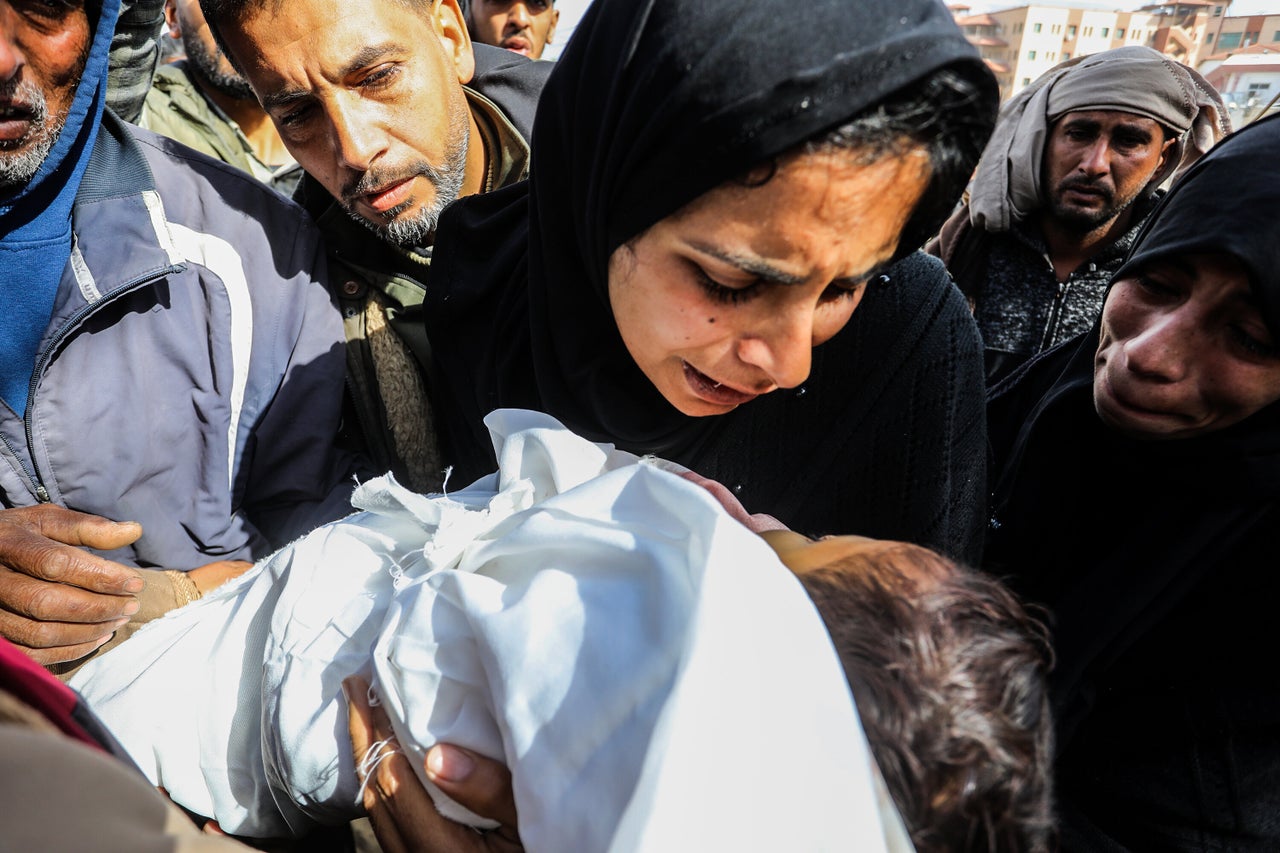 A Palestinian mother grieves her 3-year-old child, Omar, who was killed in Israel's overnight bombardment on Gaza, after receiving his body from the morgue of Nasser Hospital on March 20, 2025.