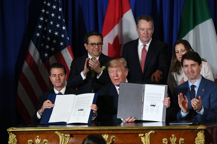 Then-presidents Enrique Peña Nieto of Mexico, Donald Trump of the U.S. and Canadian Prime Minister Justin Trudeau are pictured after signing the U.S.-Mexico-Canada Agreement (USMCA) in Buenos Aires in 2018.