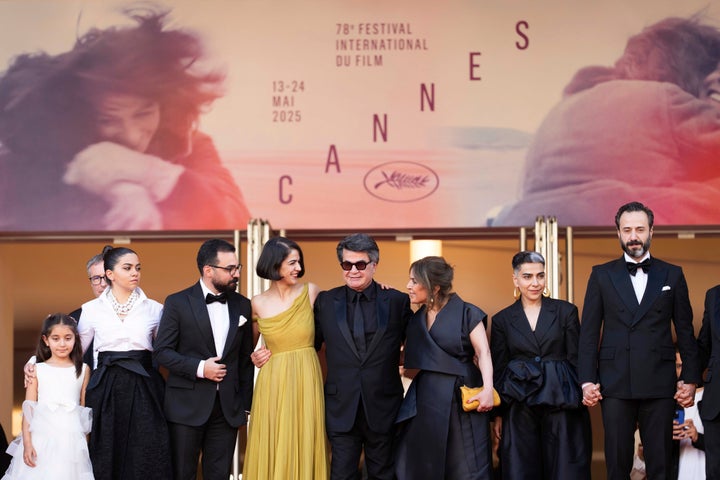 Ebrahim Azizi, Mariam Afshari, Majid Panahi, director Jafar Panahi, Delnaz Najafi, Hadis Pakbaten, and Vahid Mobseri pose for photographers upon arrival at the premiere of the film 'It was just an accident' at the 78th international film festival, Cannes, southern France, Tuesday, May 20, 2025. (Photo by Scott A Garfitt/Invision/AP)