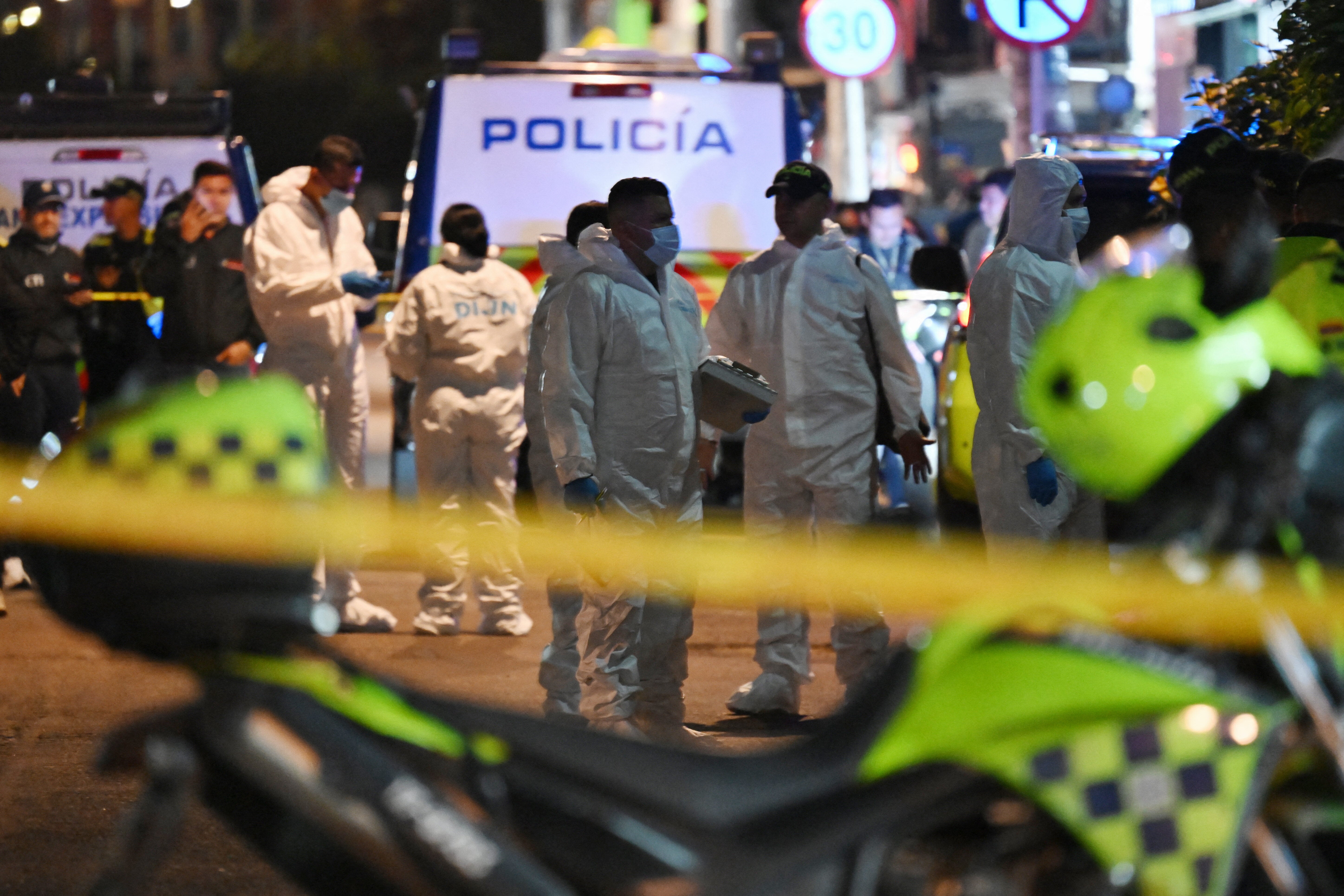 TOPSHOT - Forensic experts work at the crime scene where Senator Miguel Uribe Turbay was shot and wounded in the Modelia neighborhood in Bogota on June 7, 2025. A Colombian right-wing opposition senator and candidate for next year's presidential election, Miguel Uribe Turbay, 39, was shot and wounded in Bogota on June 7, 2025, various media reported, while the government denounced an "attack." (Photo by RAUL ARBOLEDA / AFP) (Photo by RAUL ARBOLEDA/AFP via Getty Images)