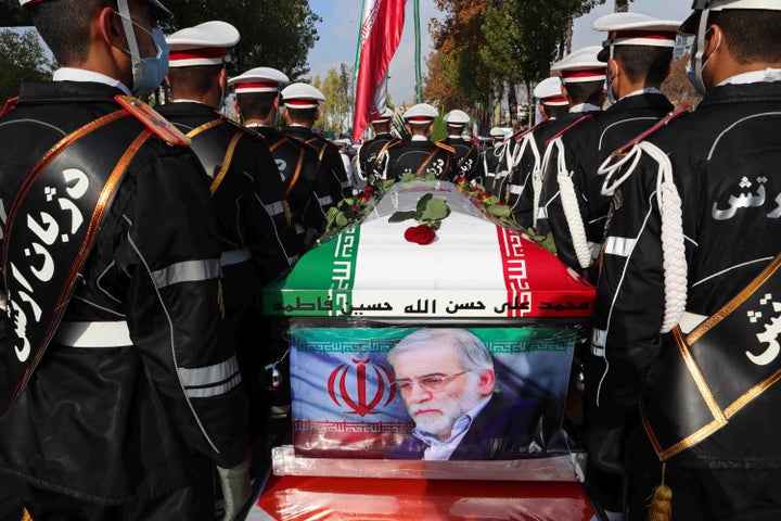 In this photo released by the official website of the Iranian Defense Ministry, military personnel stand near the flag-draped coffin of Mohsen Fakhrizadeh, a top nuclear scientist who was killed, during a funeral ceremony in Tehran, Iran, on Nov. 30, 2020. An Iranian court in 2022 ordered the U.S. government to pay over $4 billion to the families of Iranian nuclear scientists who have been killed in targeted attacks in recent years, state-run media reported.