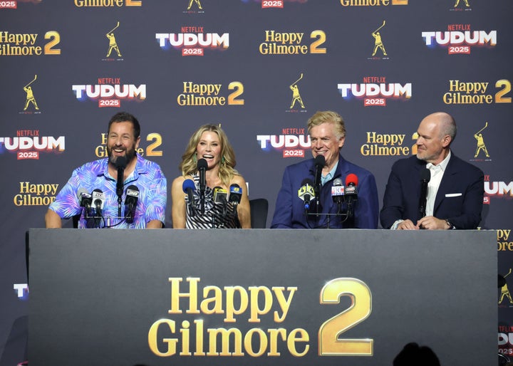 (Left to right) Adam Sandler, Julie Bowen, Christopher McDonald, and Rich Eisen speak onstage during Netflix Tudum 2025 on May 31 in Inglewood, California.