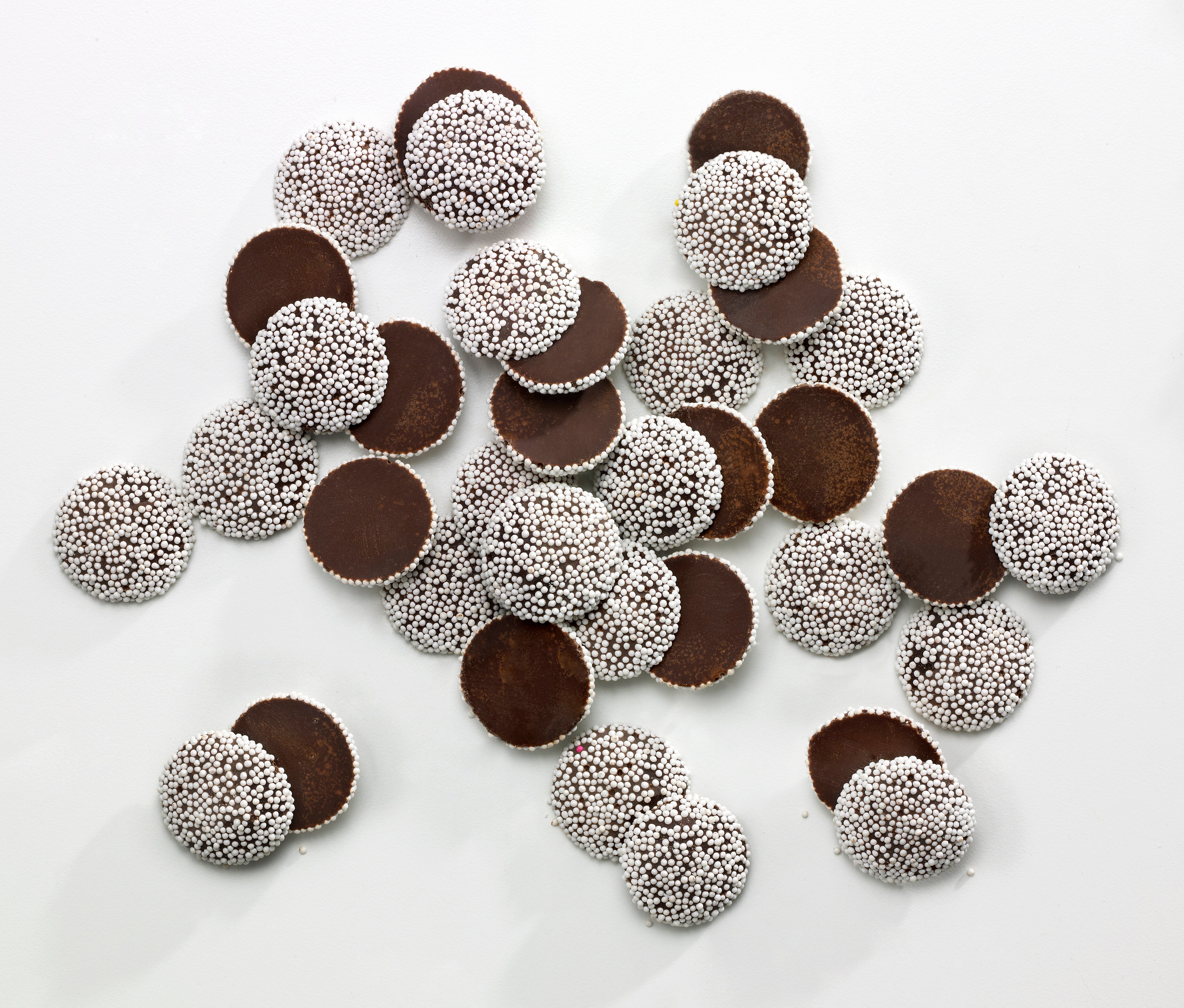 Nonpareils are typically covered in white sprinkles, as seen above.
